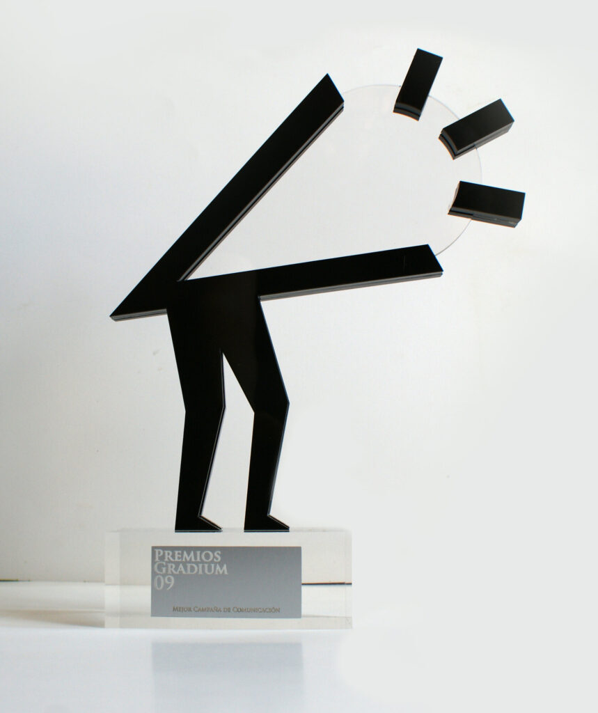 The Gradium 2009 trophy, a black acrylic figure leaning forward and shouting, designed by the studio