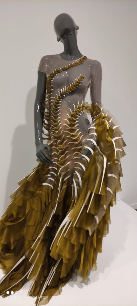A sculptural golden dress in Material Futures, Fashion Fictions, Vancouver Art Gallery, 2023